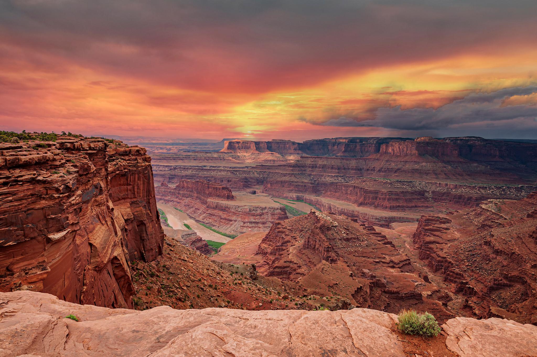 a wide shot of a canyon at sunset